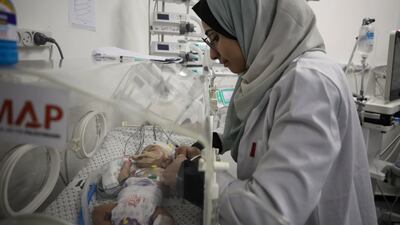 A Palestinian baby receives treatment in an incubator at the Patient Friends Hospital in Gaza city. AP