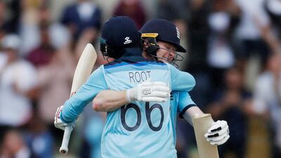 England captain Eoin Morgan and batsman Joe Root celebrate after reaching the Cricket World Cup final. Reuters