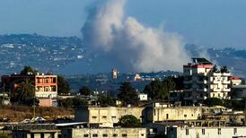 Smoke rises following explosions carried out by Israel in Deir Siryan, southern Lebanon, on Tuesday. AFP