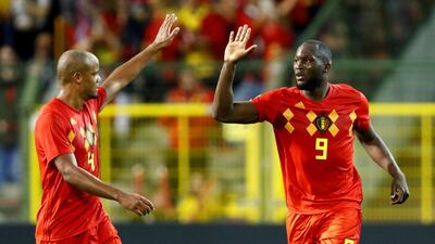 Belgium's Romelu Lukaku celebrates scoring their second goal with Vincent Kompany. Reuters