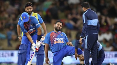 India captain Rohit Sharma had to retire hurt because of a calf injury. Getty