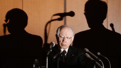 Shadows of Nobel Prize-winning chemist and President of Japanese research institute RIKEN Ryoji Noyori (L) and a RIKEN executive member are cast on the wall behind Noyori during a news conference in Tokyo. Yuya Shino / Reuters