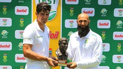 Hashim Amla, right, will lead the top-ranked Test team South Africa in the battle against Alastair Cook's England, the world No 6 team. Getty Images