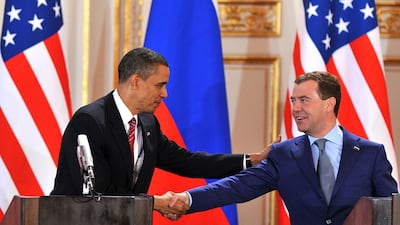 Former US president Barack Obama, left, with former Russian president Dmitry Medvedev after signing the New Start nuclear agreement in 2010 in Prague. AFP
