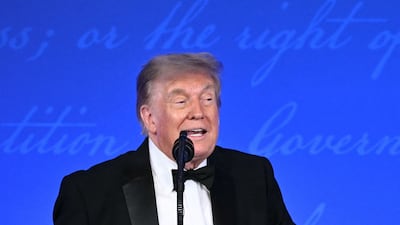 US President Donald Trump addresses the White House Correspondents' Association Dinner in Washington on Friday. AFP
