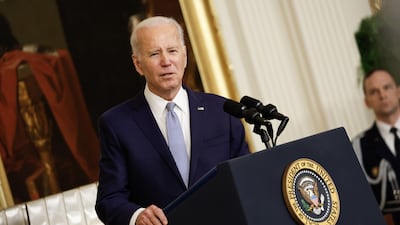 Mr Biden speaks at the medal ceremony. Bloomberg