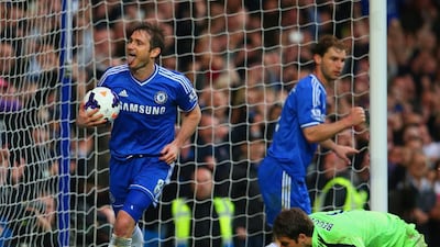 Frank Lampard of Chelsea celebrates scoring their second goal from the rebound of his penalty during the Premier League match between Chelsea and Stoke City at Stamford Bridge on April 5, 2014 in London, England. Julian Finney / Getty Images
