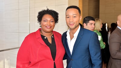 Recording artist John Legend appeared for Ms Abrams when she ran in 2018 and again this weekend. Getty / The Hollywood Reporter