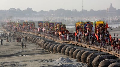 Saints of Shri Panchayati Bada Udasin return to their camp at the confluence of rivers Ganga, Yamuna and the mythical river Saraswati on Makar Sankranti at Prayagraj in Uttar Pradesh state, India, Tuesday, Jan. 15, 2019. The Kumbh Mela is a series of ritual baths by Hindu holy men, and other pilgrims at the confluence of three sacred rivers — the Yamuna, the Ganges and the mythical Saraswati — that dates back to at least medieval times. The city's Mughal-era name Allahabad was recently changed to Prayagraj. (AP Photo/Rajesh Kumar Singh)