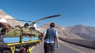 The Air Wing unit rescues a man off Jebel Jais. Courtesy Security Media