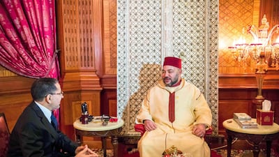 King Mohammed VI of Morocco (R) with his new Prime Minister Saadeddine El Othmani in Casablanca. On March 17, 2017, Mr E; Othmani replaced Abdelilah Benkirane who was unable to form a government five months after winning the election. Photo courtesy of Moroccan Royal Palace / AFP