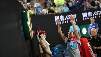 Ons Jabeur signs autographs for fans after winning her first-round match against Tamara Zidansek. Reuters