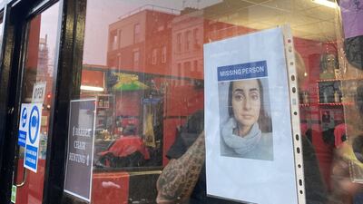 A missing poster for Petra Srncova is placed in a window of a shop in Camberwell, London. PA