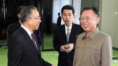 The North Korean leader Kim Jong Il, right, with the Chinese president Hu Jintao's special envoy Dai Bingguo, left, in Pyongyang.