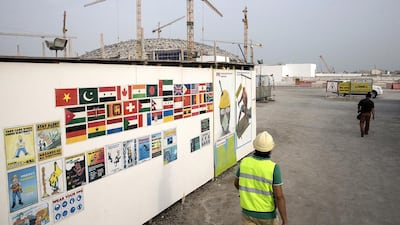 Artwork is the tool of choice to remind workers at the Louvre Abu Dhabi to adhere to health and safety practices, The wall of art is the first thing they see as they come on site. Silvia Razgova / The National