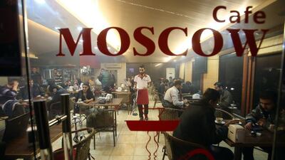 In the Cafe Moscow in Latakia city on the coast, Russian soldiers are reportedly drinking and dining for free. Youssef Karwashan / AFP