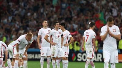 Poland were a heartbroken side after losing to Portugal in the Euro 2016 quarter-finals on Thursday night. Thanassis Stavrakis / AP Photo