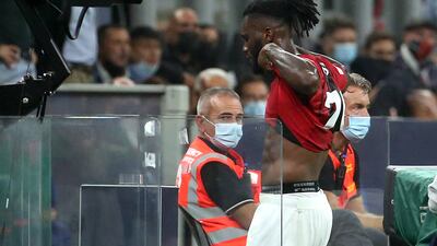 AC Milan's Franck Kessie leaves the pitch after being sent off. EPA