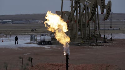 Oil pump jacks near Watford City, North Dakota. As oil rises other commodities have fallen. AP