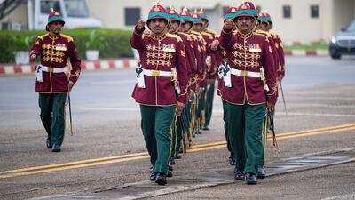 A guard of honour welcomes Sheikh Mohamed to Oman