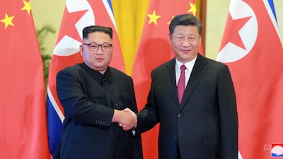 The leaders shake hands.