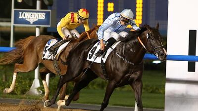 Frankyfourfingers, right, wins the Al Maktoum Challenge - Round 2 in Dubai. Pawan Singh / The National