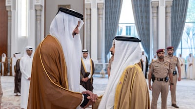 Bahrain's King Hamad and Sheikh Tamim at Lusail Palace. AFP