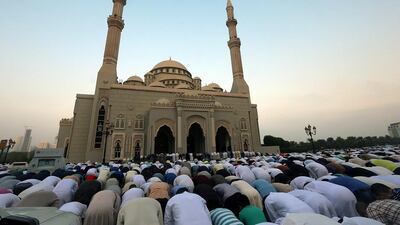 People offer Eid prayers at Al Noor Mosque in Sharjah. Satish Kumar / The National