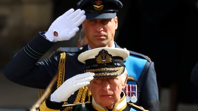 Britain's King Charles III and Prince William salute as they attend the state funeral of Britain's Queen Elizabeth II in London on September 19. AP