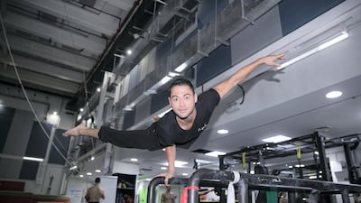 Danik Abishev, Artist and Hand balance specialist Reem Mohammed / The National