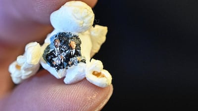 A scene from 'Pulp Fiction' painted on a piece of popcorn by Turkey's micro artist Hasan Kale