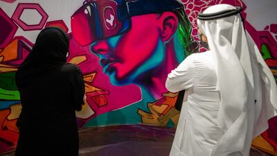 A graffiti art workshop at the World Conference on Creative Economy 2021, held at Expo 2020 Dubai. Victor Besa / The National.