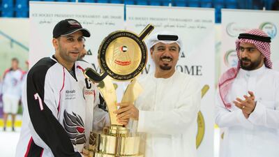 Abu Dhabi Storms captain Juma Al Dhaheri celebrating their win over Belarus in the President's Cup final at the Zayed Sport City Ice Rink. Leslie Pableo for The National