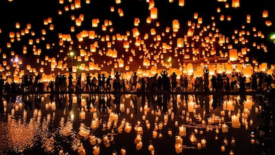 Revellers release lanterns into the air in celebration of the Yee Peng festival in Chiang Mai, Thailand. Roberto Schmidt / AFP Photo / November 3, 2017