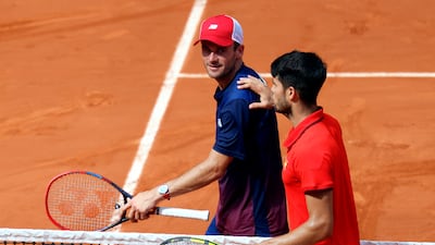 Carlos Alcaraz and Tommy Paul after their match. EPA