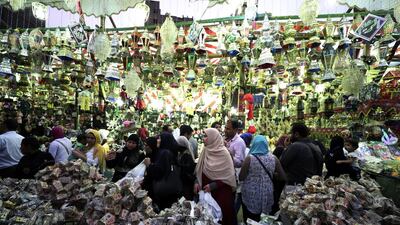 Egyptians buy Ramadan decoration items 'Fanous' (Lantern) at a market in Cairo, Egypt. Date traders in Egypt have the annual tradition of naming their merchandise after local and foreign celebrities and landmark events prior to Ramadan. EPA