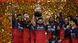 Cricket - Indian Premier League - IPL - Final - Royal Challengers Bengaluru v Gujarat Titans - Narendra Modi Stadium, Ahmedabad, India - May 31, 2026 Royal Challengers Bengaluru's Virat Kohli lifts the trophy as he celebrates with teammates after winning the Indian Premier League REUTERS / Amit Dave