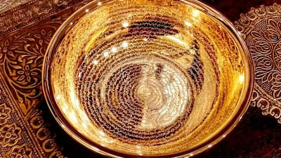 Amir Hossein's engravings on a golden bowl. Courtesy Amir Hossein