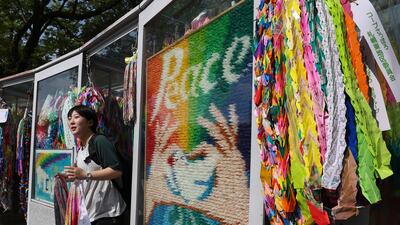A visitor at the Children’s Peace Monument in Hiroshima before the 80th anniversary of the atomic bomb being dropped on the Japanese city. Getty Images