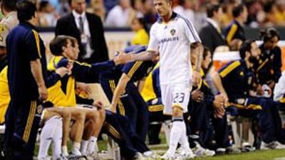 David Beckham leaves the game in the second half against AC Milan at The Home Depot Center.