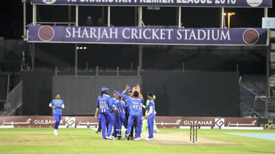 Gulbadin Naib of Balkh takes the wicket of Mohammad Shahzad of Paktia during the game between Balkh Legends and Paktia Panthers in the Afghanistan Premier League. Chris Whiteoak / The National