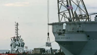 The flagship of the US 6th Fleet in the Mediterranean, the USS Mount Whitney, is seen in the Georgian port Poti, while unloading humanitarian aid for Georgia, Sept 6 2008.