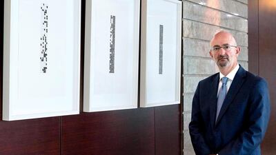 Emirates Investment Bank CEO Khaled Sifri, with the bank's art collection. Duncan Chard for the National.