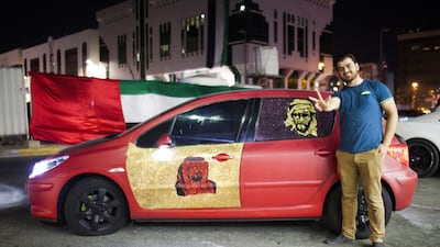 With National Day less than 24 hours away, many people have been busy customising their vehicles for celebrations. Drivers are reminded of the regulations regarding decor. Fares Mohammed, owner of Cleem Car accessories, shows off the work done on his car. Lee Hoagland / The National