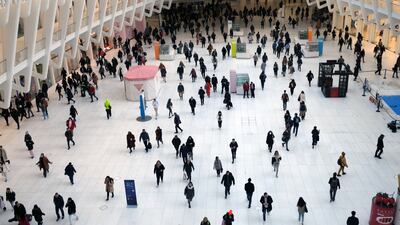 Commuters in the Oculus station and mall in Manhattan. New York City residents need to earn at least $312,000 to get the purchasing power of $100,000, according to new research. AFP