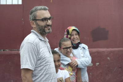 Orhan Kaya, 40, and his family in Fatih, Istanbul. Photo by Shawn Carrié