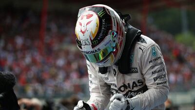 Mercedes driver Lewis Hamilton celebrates after winning the Belgian Grand Prix on Sunday at Spa-Francorchamps. Paul Gilham / Getty Images / August 23, 2015