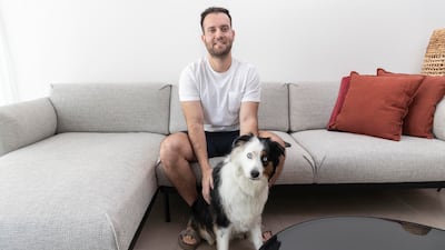 Husam Lutfi lives in a one-bedroom apartment with his Australian shepherd dog, Paolo, in Dubai Hills. All photos: Antonie Robertson/The National