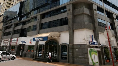 The Novotel Centre Hotel on Hamdan Street became the tallest on completion in 1976, standing at 20 floors and almost 83 metres. Stephen Lock / The National