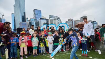 A young cricket fan bats during the T20 World Cup Trophy Tour Launch in Melbourne, Australia. Getty Images